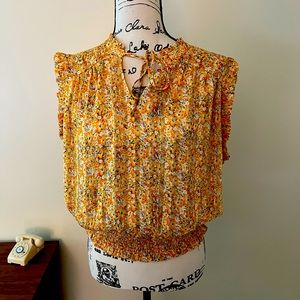 Rachel Zoe sleeveless floral blouse size L with tie and ruffle detail